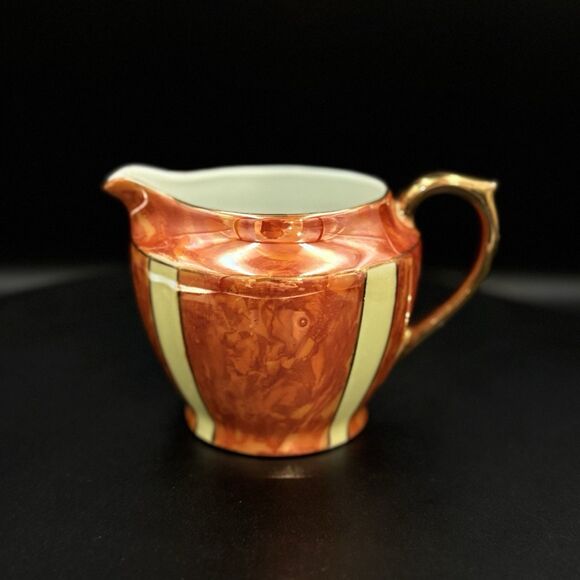 Vintage Oscar Schaller & Co. Orange Lusterware Creamer With Yellow Stripe Detail - Picture 1 of 6